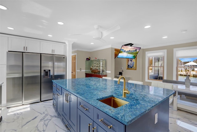 505 E Dr, Copiague, NY 11726 - kitchen with a sink, stainless steel fridge with ice dispenser, crown molding, recessed lighting, and white cabinets