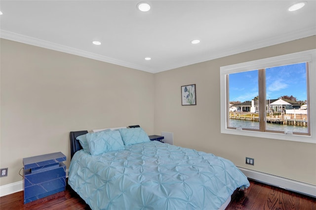 505 E Dr, Copiague, NY 11726 - bedroom with a baseboard heating unit, crown molding, wood finished floors, baseboards, and recessed lighting