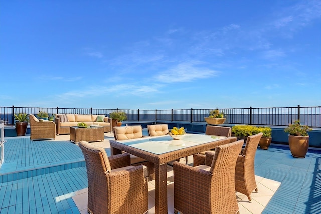 505 E Dr, Copiague, NY 11726 - wooden terrace with outdoor lounge area and outdoor dining space