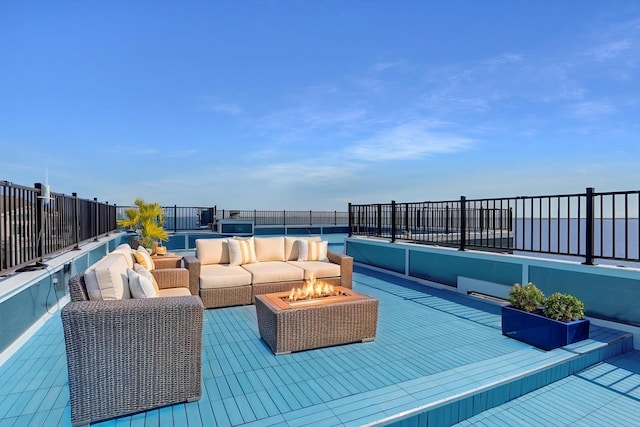 505 E Dr, Copiague, NY 11726 - view of patio featuring an outdoor living space with a fire pit