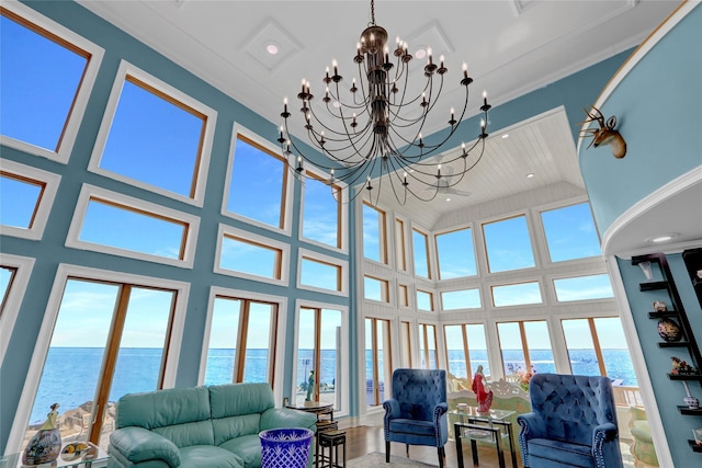 505 E Dr, Copiague, NY 11726 - sunroom / solarium with a water view and a chandelier