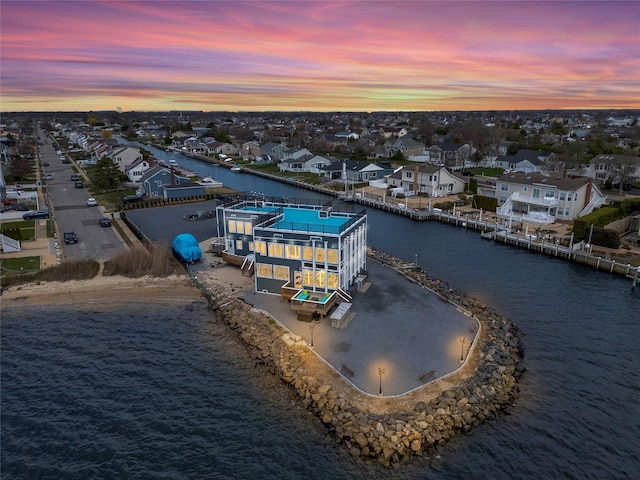 505 E Dr, Copiague, NY 11726 - aerial view at dusk of a water view and a residential view