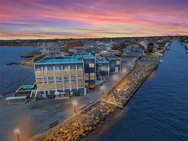 505 E Dr, Copiague, NY 11726 - aerial view at dusk of a water view and a residential view