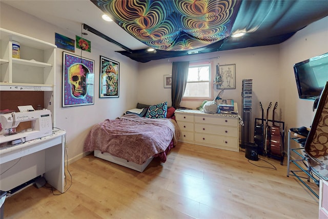 bedroom featuring light wood-type flooring