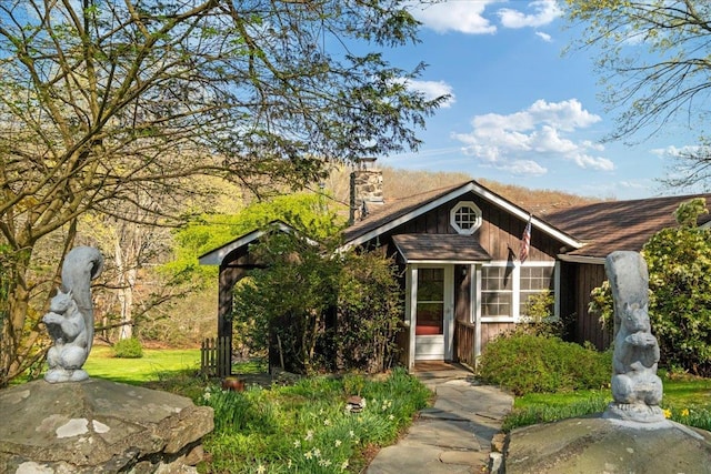 view of front of property with a chimney