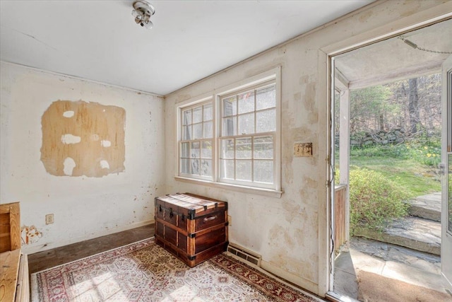 interior space featuring baseboards