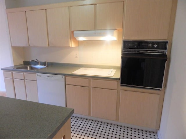 412 Benedict Ave Unit 5J, Tarrytown, NY 10591 - kitchen with white appliances, under cabinet range hood, light brown cabinets, and light floors