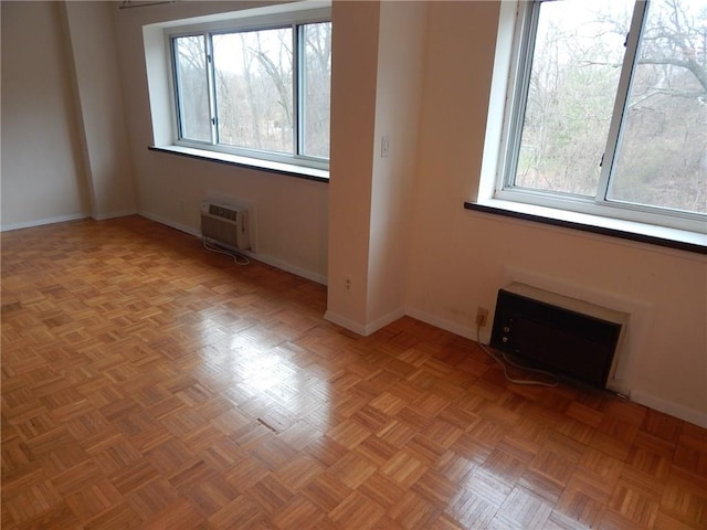412 Benedict Ave Unit 5J, Tarrytown, NY 10591 - empty room featuring plenty of natural light and a wall mounted AC