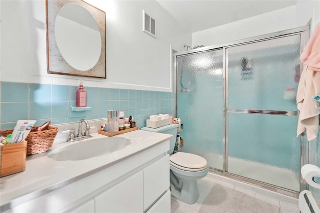3145 37th St, Astoria, NY 11103 - bathroom featuring visible vents, a baseboard radiator, a shower stall, and tile patterned flooring