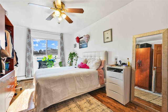 3145 37th St, Astoria, NY 11103 - bedroom featuring ceiling fan and wood finished floors
