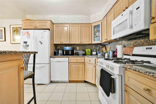 3145 37th St, Astoria, NY 11103 - kitchen featuring decorative backsplash, white appliances, light tile patterned flooring, and light brown cabinetry