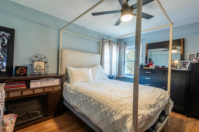 bedroom with wood finished floors