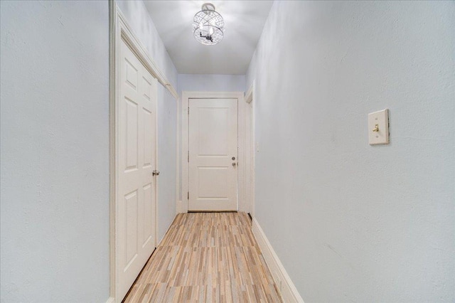 61 Haseco Ave, Port Chester, NY 10573 - hall with light wood-style flooring and baseboards