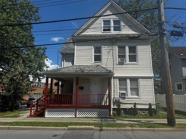 61 Haseco Ave, Port Chester, NY 10573 - view of front of property with covered porch and cooling unit