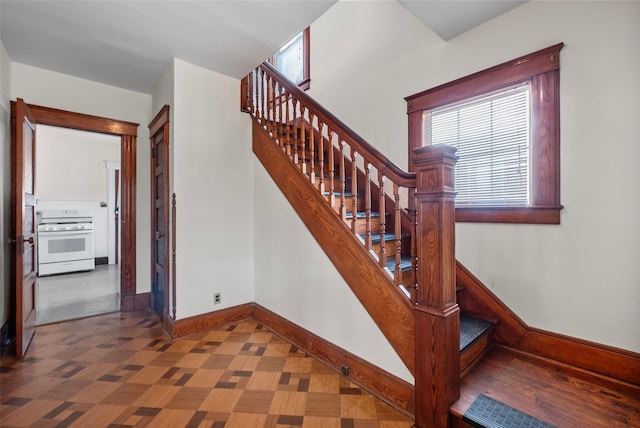 stairway with baseboards