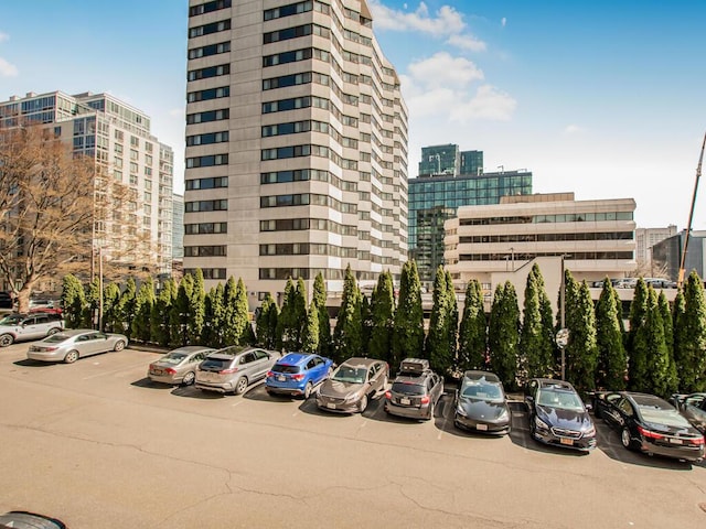 25 Rockledge Ave Unit 117, White Plains, NY 10601 - view of building exterior with a view of city and uncovered parking