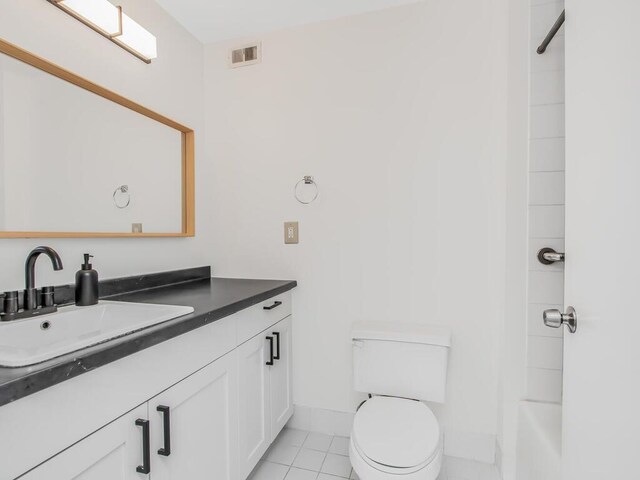25 Rockledge Ave Unit 117, White Plains, NY 10601 - bathroom with toilet, tile patterned floors, vanity, and visible vents