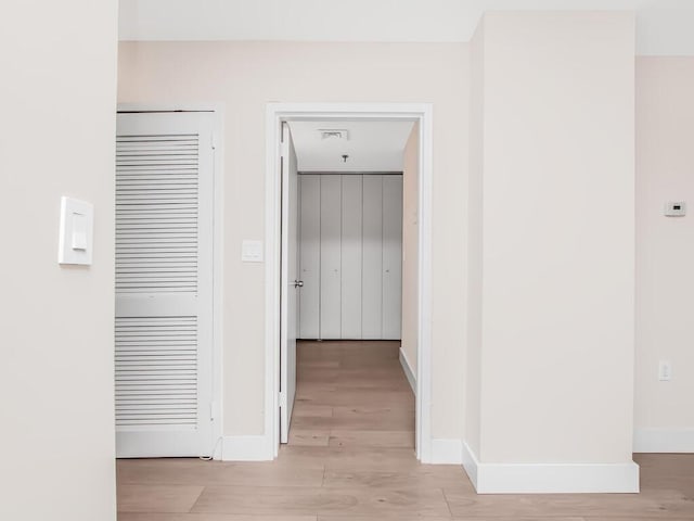 25 Rockledge Ave Unit 117, White Plains, NY 10601 - hall featuring visible vents, baseboards, and light wood-type flooring