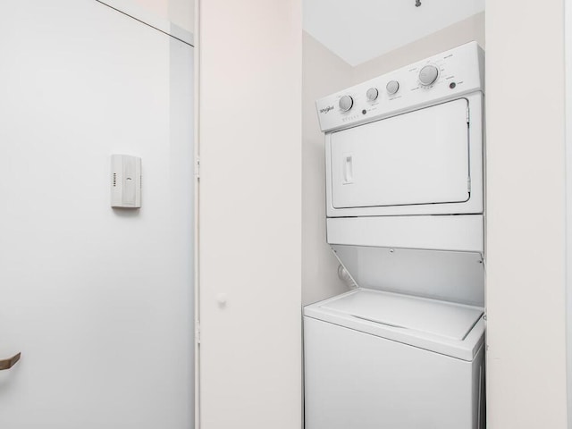 25 Rockledge Ave Unit 117, White Plains, NY 10601 - washroom featuring laundry area and stacked washer / drying machine