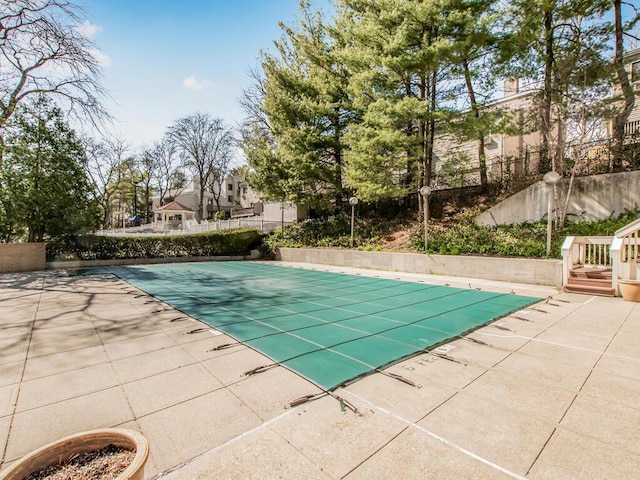 25 Rockledge Ave Unit 117, White Plains, NY 10601 - view of swimming pool featuring a fenced in pool and a patio