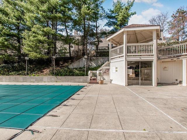 25 Rockledge Ave Unit 117, White Plains, NY 10601 - view of pool featuring stairway, a fenced in pool, and a patio