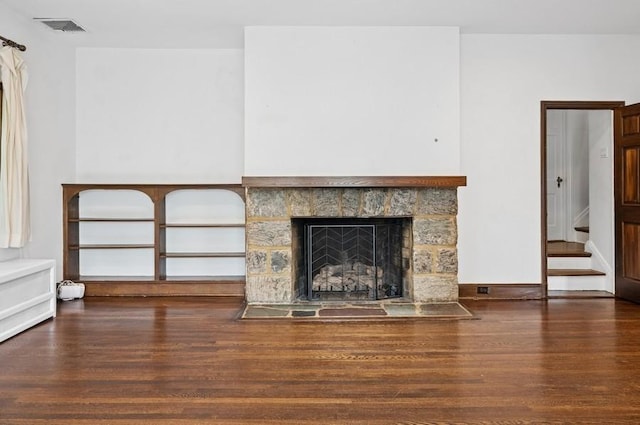 51 Valley Rd, Larchmont, NY 10538 - unfurnished living room with wood finished floors, stairway, and a fireplace
