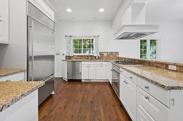 51 Valley Rd, Larchmont, NY 10538 - kitchen featuring stainless steel appliances, custom range hood, plenty of natural light, dark wood-style flooring, and recessed lighting