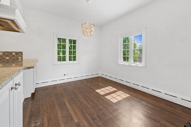 51 Valley Rd, Larchmont, NY 10538 - unfurnished dining area featuring dark wood-style flooring, a chandelier, and a baseboard radiator