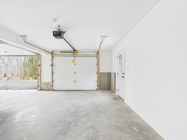 garage featuring a garage door opener