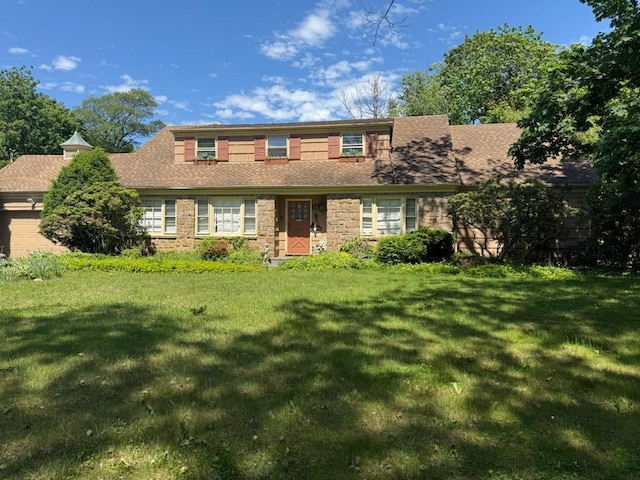 66 Willow Rd, Woodsburgh, NY 11598 - view of front of house with a front yard and roof with shingles