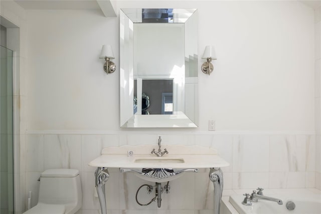 3 Clay Pit Rd, Remsenburg, NY 11960 - bathroom with a bath, toilet, wainscoting, and a sink