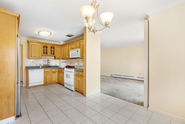 kitchen with a chandelier, white appliances, dark countertops, light colored carpet, and a baseboard radiator