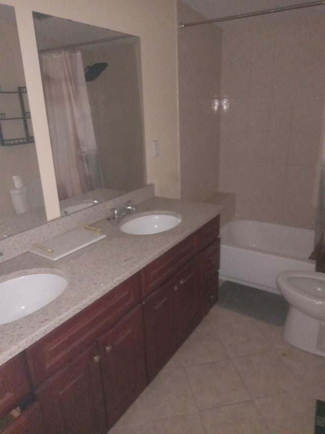 250 Wheeler Rd, Hauppauge, NY 11788 - bathroom featuring toilet, tile patterned floors, and a sink