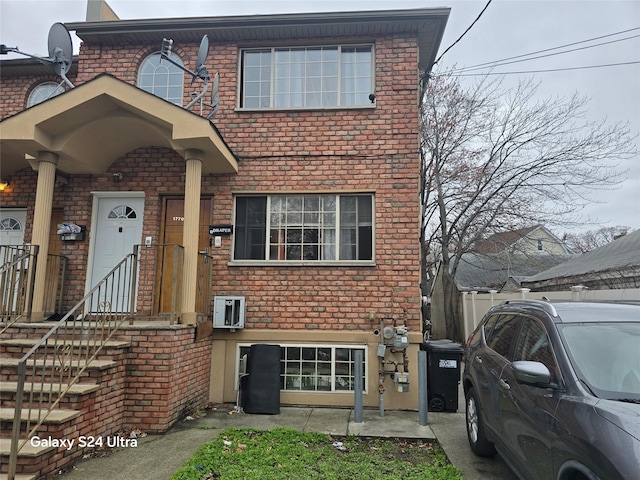 17709 112th Ave, Addisleigh Park, NY 11433 - townhome / multi-family property featuring brick siding