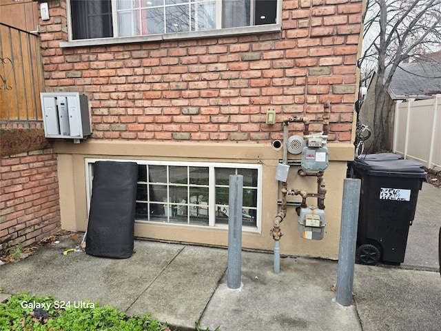 17709 112th Ave, Addisleigh Park, NY 11433 - exterior details featuring gas meter and brick siding