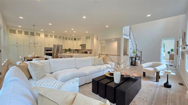 8 Marker Rdg Unit 4, Irvington, NY 10533 - living room with recessed lighting and light wood finished floors