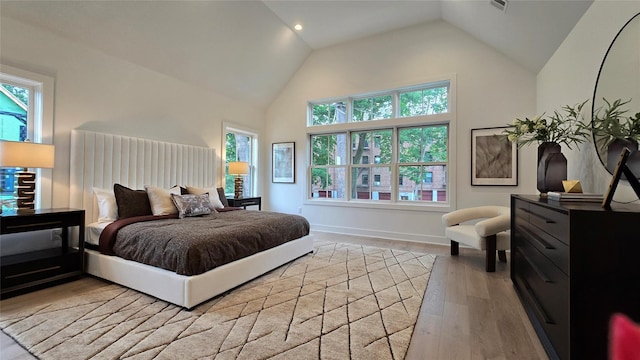 8 Marker Rdg Unit 4, Irvington, NY 10533 - bedroom with light wood-style floors, multiple windows, and high vaulted ceiling
