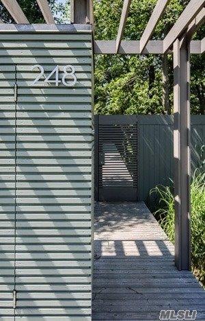 248 Bay Walk, Fire Island Pines, NY 11782 - view of gate featuring fence