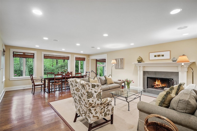 17 Eastwoods Rd, Pound Ridge, NY 10576 - living area with a tile fireplace, wood finished floors, baseboards, and recessed lighting