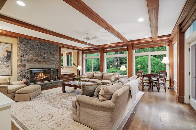 17 Eastwoods Rd, Pound Ridge, NY 10576 - living room with beam ceiling, ceiling fan, a stone fireplace, wood finished floors, and recessed lighting