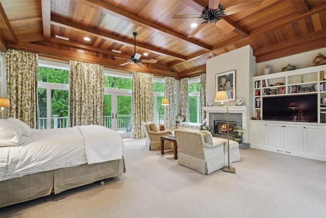 17 Eastwoods Rd, Pound Ridge, NY 10576 - carpeted bedroom with wood ceiling, a glass covered fireplace, access to exterior, and french doors