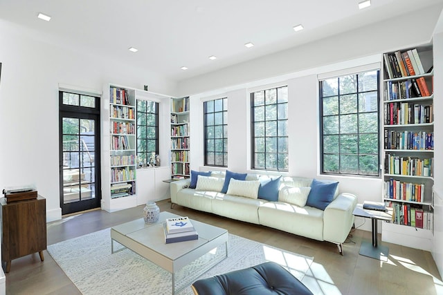 165 Valley Rd, New Rochelle, NY 10804 - living area featuring wood finished floors and built in shelves