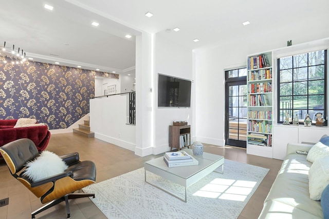 165 Valley Rd, New Rochelle, NY 10804 - living room with baseboards, crown molding, recessed lighting, wood finished floors, and stairs