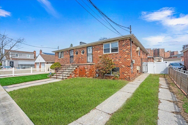 134-15 160th St, Jamaica, NY 11434 - view of front facade with brick siding and a gate