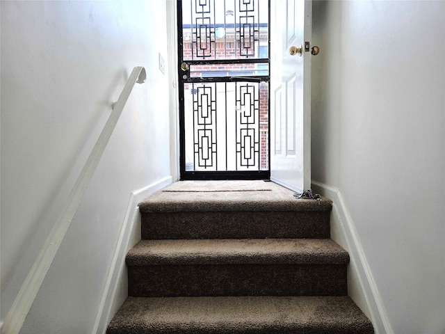 134-15 160th St, Jamaica, NY 11434 - stairway with baseboards and carpet floors