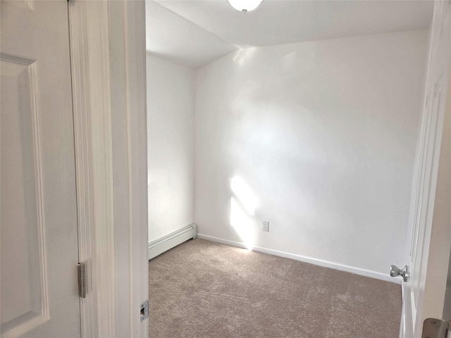 134-15 160th St, Jamaica, NY 11434 - carpeted spare room with a baseboard radiator, vaulted ceiling, and baseboards