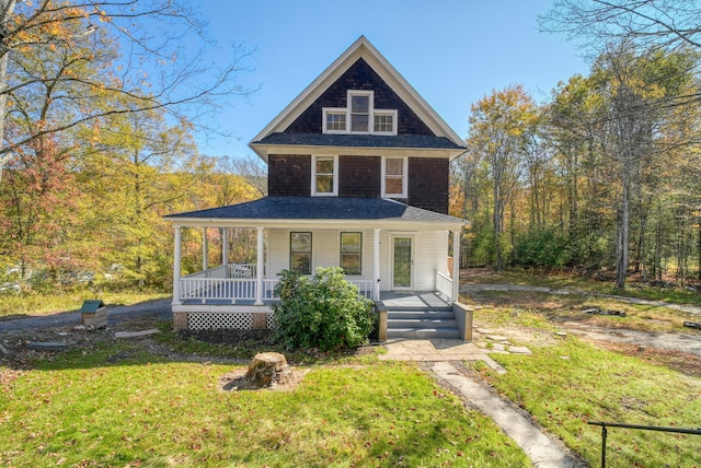 58 Summitville Rd, Wurtsboro, NY 12790 - view of front facade featuring covered porch and a front lawn
