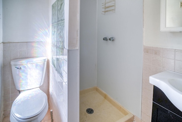 58 Summitville Rd, Wurtsboro, NY 12790 - full bathroom featuring toilet, a wainscoted wall, tile walls, and a stall shower