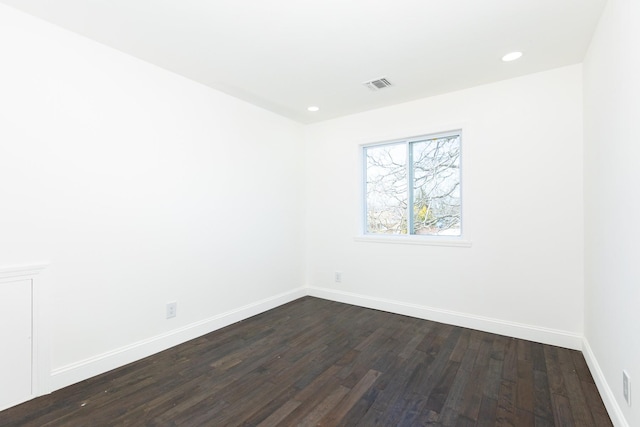 38 Melody Ln, Amityville, NY 11701 - spare room featuring baseboards, dark wood finished floors, visible vents, and recessed lighting