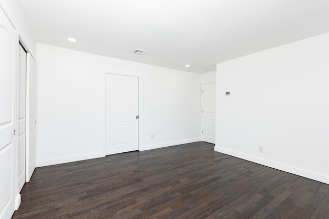 38 Melody Ln, Amityville, NY 11701 - unfurnished bedroom featuring visible vents, baseboards, recessed lighting, and dark wood finished floors